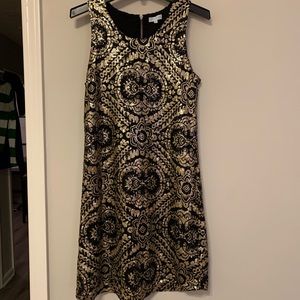 Black and Gold sequin dress.